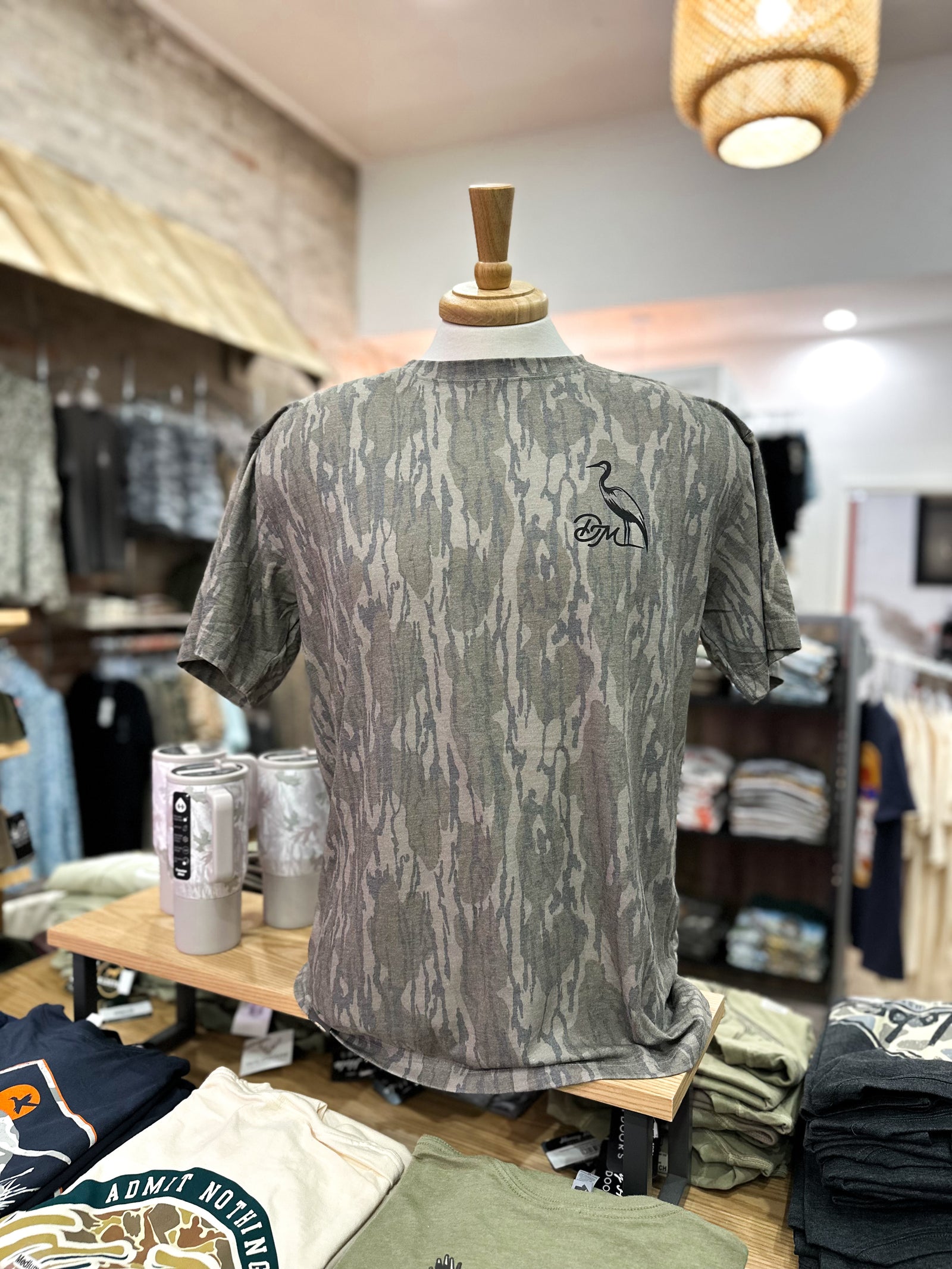 Dirty Marsh Bottomland Camo Backshore Logo