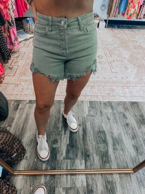 Give It a Guess Olive Distressed Shorts